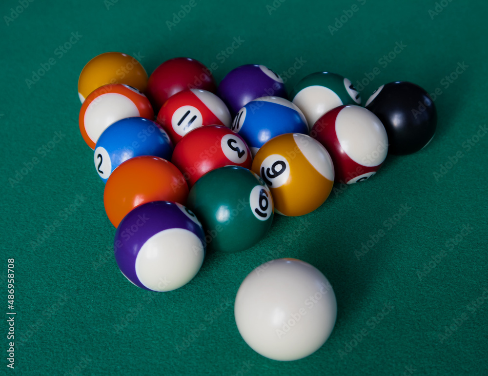 Billiard table with a selection of balls. Game. Snooker, billiards. Billiard table with a selection of balls. Game. Snooker, billiards.