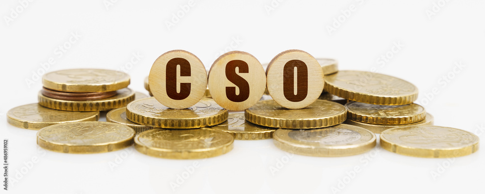 On a white surface lie coins and circles with the inscription - CSO On a white surface lie coins and circles with the inscription - CSO