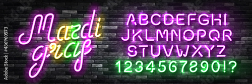 Vector realistic isolated neon sign of Mardi Gras with easy to change color alphabet font on the wall background.
