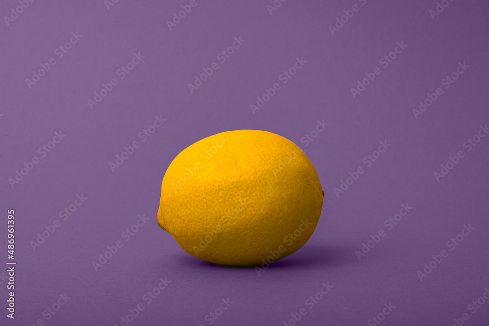 Lemon on a clear colored background