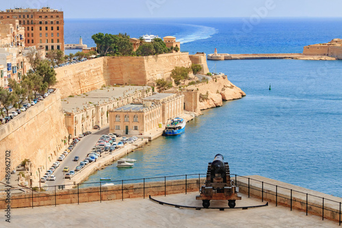 Valletta port gates and old historical canon - Malta photo