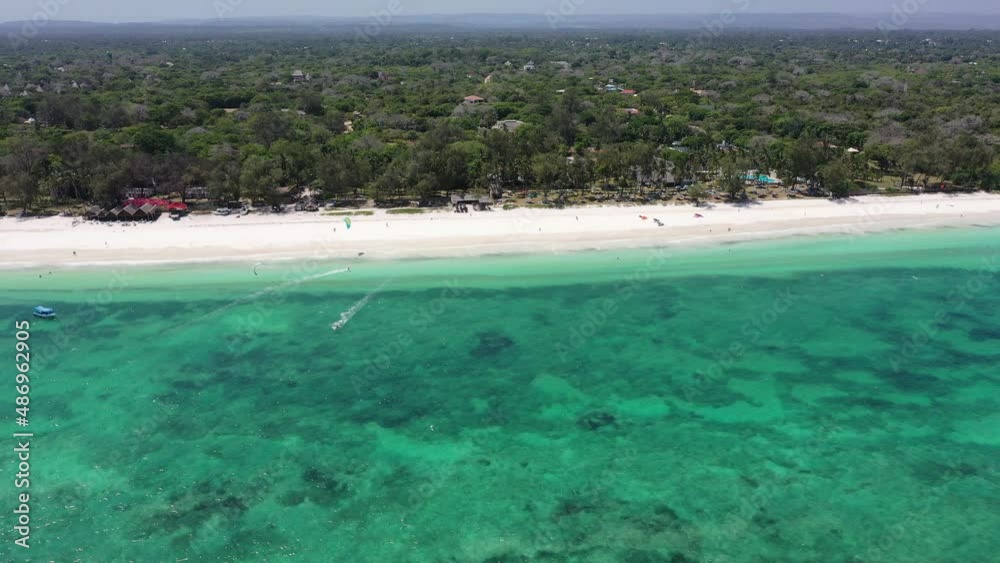African Coastline Diani beach Drone landscape Kenya Sea aerial 4k waves blue indan ocean tropical mombasa turquoise white sand East Africa palms paradise sport water wind kite surfing in Africa African Coastline Diani beach Drone landscape Kenya Sea aerial 4k waves blue indan ocean tropical mombasa turquoise white sand East Africa palms paradise sport water wind kite surfing in Africa