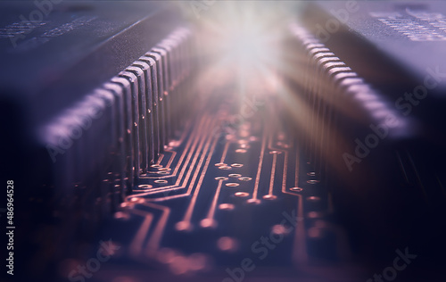 Macrophotograhy  of integraded circuits on Printed Circuit Board with golden pads and wires