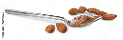 Spoon with tasty almond butter isolated on white photo