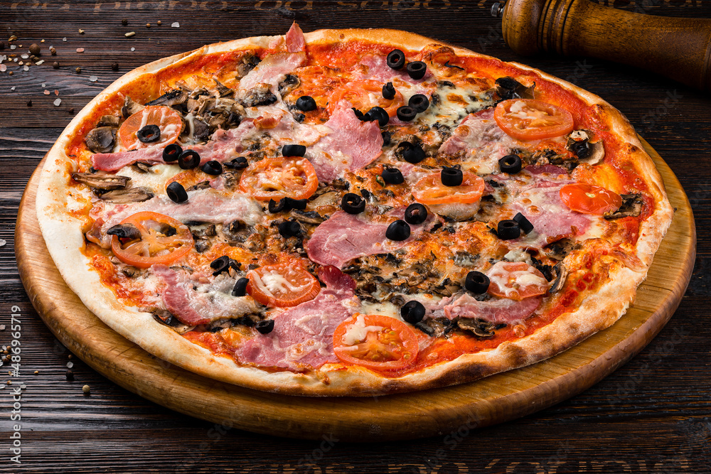 pizza with bacon ham on wooden table, Top view