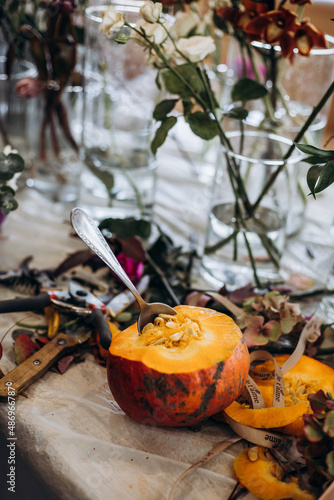 Pumpkin decoration with fresh flowers