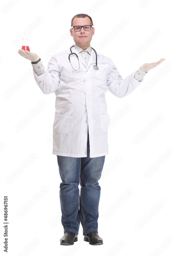 Young research scientist holds a beaker of red liquid isolated on white