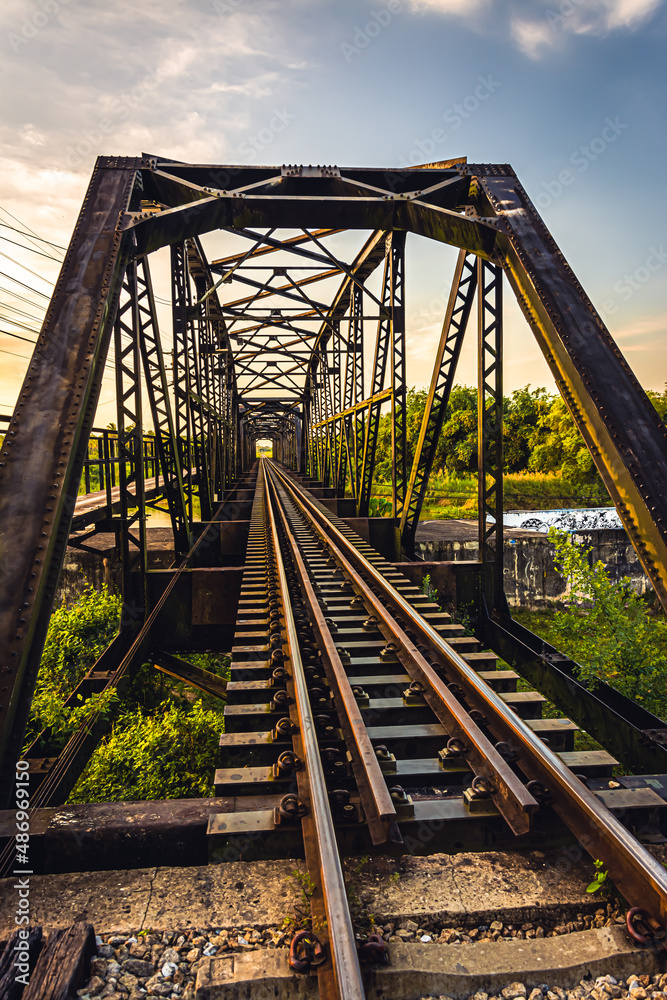 Railway bridge, Thailand Railway heading from Rueso Railway Station To Yala Railway Station. Looking at the end of the train It's exciting Railway bridge, Thailand Railway heading from Rueso Railway Station To Yala Railway Station. Looking at the end of the train It's exciting