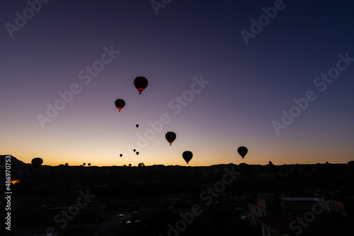Balloons taking off at sunrise in Cappadocia © ydfotograf