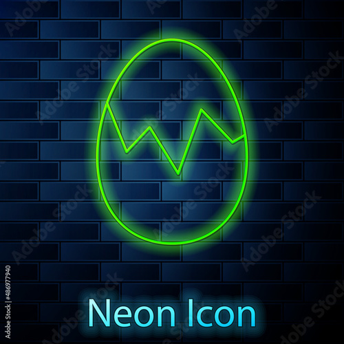 Glowing neon line Broken egg icon isolated on brick wall background. Happy Easter. Vector