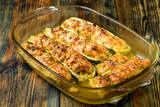 courgettes stuffed with chicken and baked with cheese