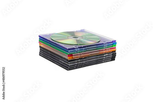 Stack of CDs in boxes on a white background.Isolate. 