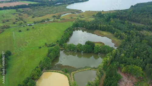 Trebonsko biosphere UNESCO reserve protected landscape area wetlands pond Rozmberk fishpond system fish hatchery cages fishing Czech largest biggest meadows Trebon, drone aerial video shot ecosystem photo