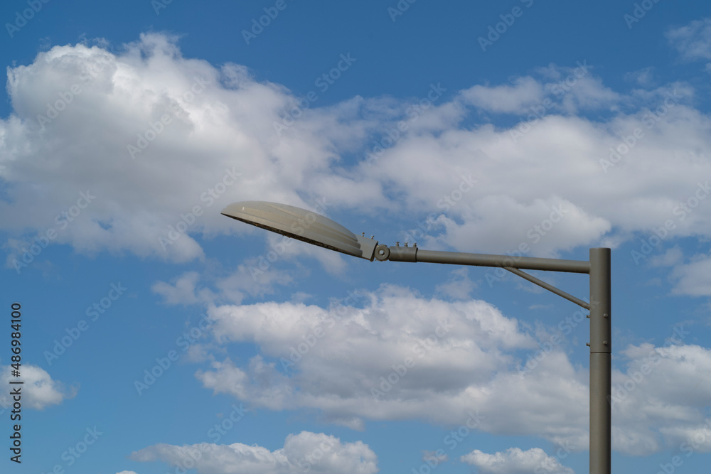 Fototapeta premium street lamp standing in a beautiful winter sky