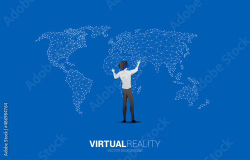 Silhouette businessman wear VR glasses with 3D world map. Concept of digital virtual reality technology and AR .