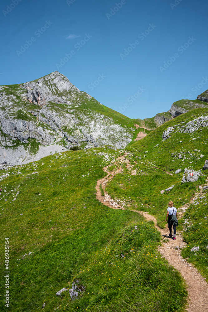 Hikers are on tour at Karwendel Rofan Mountains at Achensee in Austria