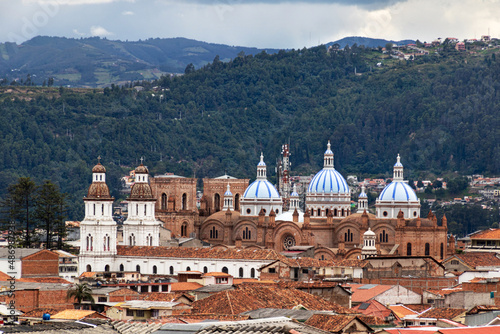 Panoramic view of the city Cuenca, Ecuador, New Cathedral or Catedral de la Inmaculada Concepción de Cuenca and surrounding mountains photo