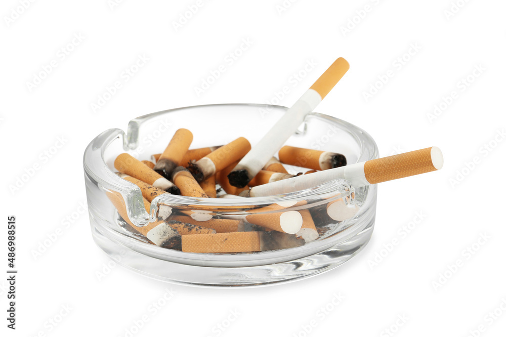Glass ashtray with cigarette stubs isolated on white Glass ashtray with cigarette stubs isolated on white