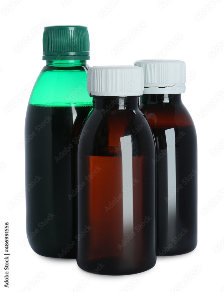 Bottles of cough syrup on white background Bottles of cough syrup on white background
