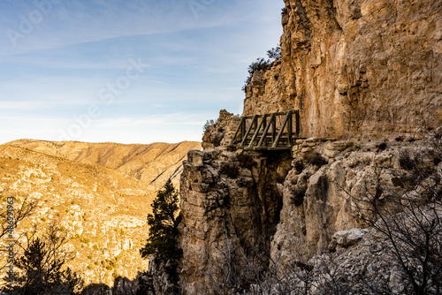 Sunrise Lights The Mountainside Behind The Wooden Bridge to Guadalupe Peak