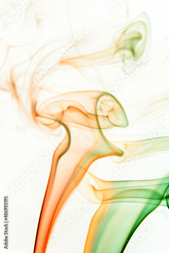 Real colorful smoke on white background. Graphic resource for use with blend modes. Fusion layers.