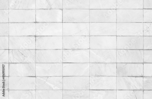 White or gray tiles ceramic wall and floor, marble abstract background. 