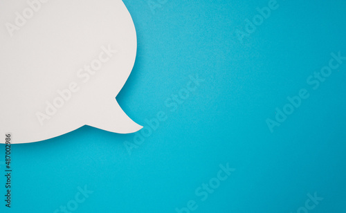 Obraz na płótnie Blank white speech bubble part on a blue background