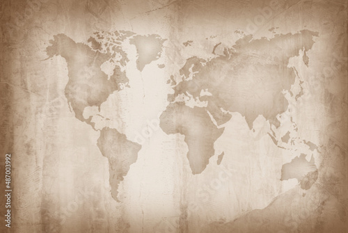 Fototapeta Naklejka Na Ścianę i Meble -  World map on an old paper texture background with space for text wind sea marine navigation.