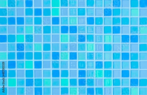Blue pastel ceramic wall and floor tiles mosaic abstract background. Design geometric wallpaper texture decoration.