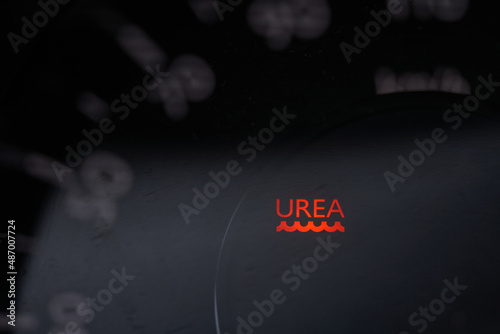 Car dashboard with indication of lack of urea