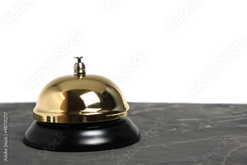 Gilded hotel service bell on a white background, isolate.