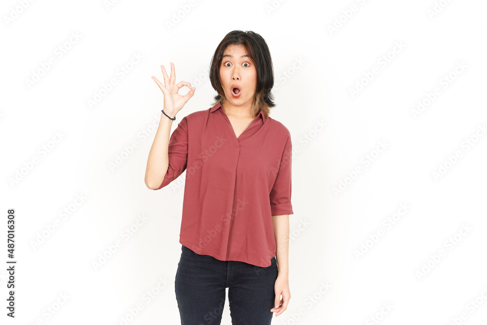 Showing OK sign Of Beautiful Asian Woman Isolated On White Background Showing OK sign Of Beautiful Asian Woman Isolated On White Background