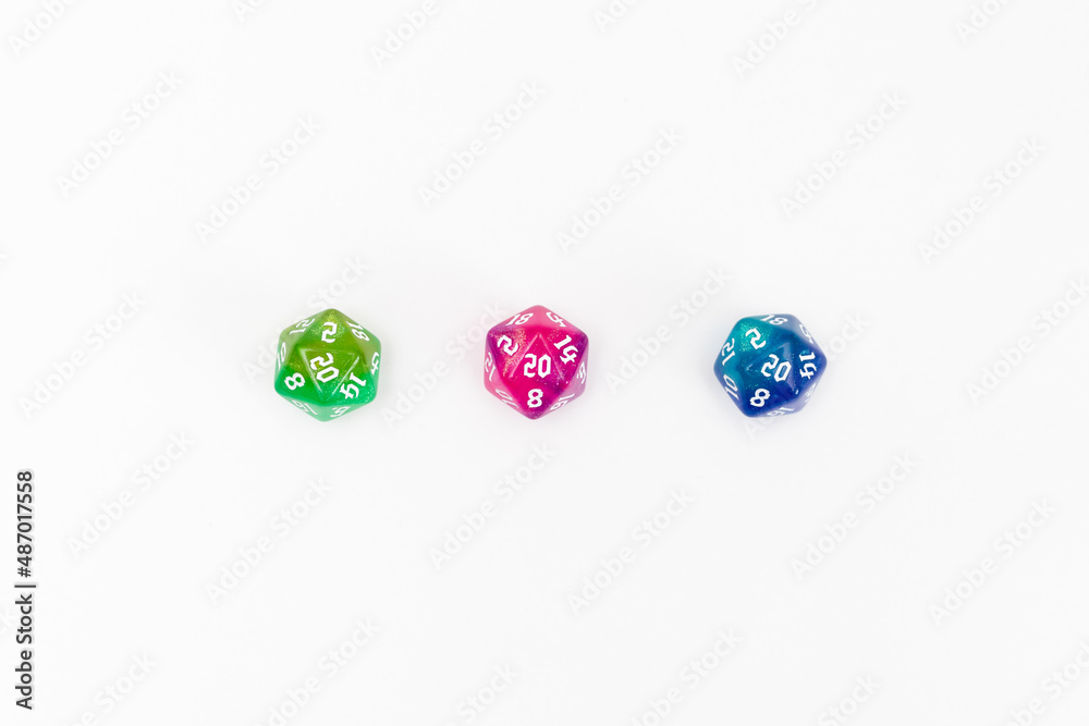Blue, green, pink dices for fantasy dnd and rpg tabletop games. Board game polyhedral dices with different sides isolated on white background
Blue, green, pink dices for fantasy dnd and rpg tabletop games. Board game polyhedral dices with different sides isolated on white background