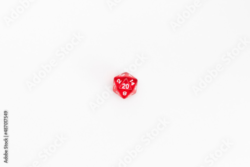 Red dice for fantasy dnd and rpg tabletop games. Board game polyhedral dice with different sides isolated on white background	

