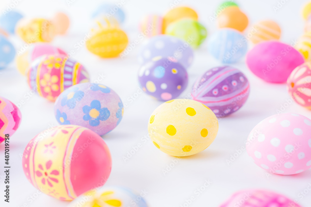 Happy Easter day colorful eggs and blurred on white background with copy space