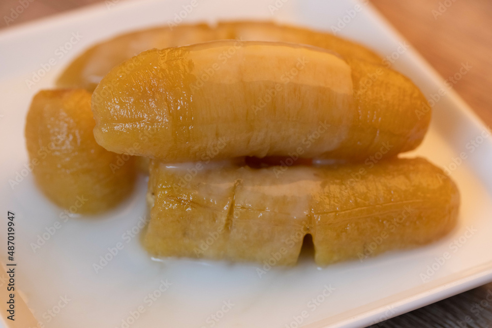 Banana syrup topped with coconut milk Banana syrup topped with coconut milk
