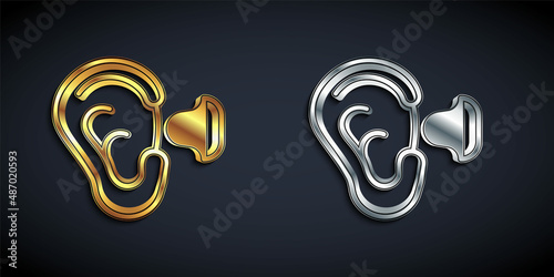 Gold and silver Earplugs and ear icon isolated on black background. Ear plug sign. Noise symbol. Sleeping quality concept. Long shadow style. Vector