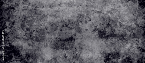 Dark cement wall background in vintage and abstract black background, closeup texture of black color. Old rubber texture, looks like a ground. Black and gray wallpaper.