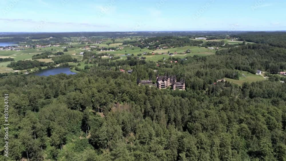 Tower tops of unfinished Lapalice castle in Poland, aerial fly backward shot Tower tops of unfinished Lapalice castle in Poland, aerial fly backward shot