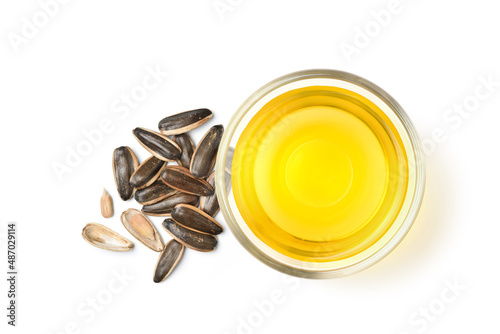 Cuadro en lienzo Flat lay of Sunflower oil with seeds isolated on white background