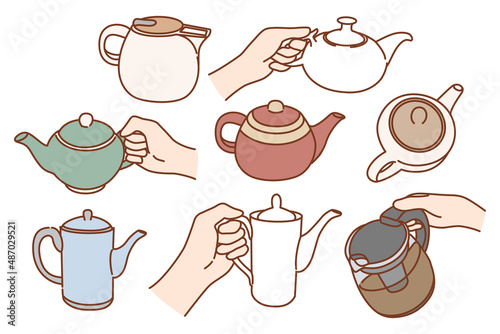 Set of diverse kettles of different shapes and sizes. Collection of teapots for tea ceremony. Person hand hold kitchenware serve warm hot beverage in kitchen. Home appliance. Vector illustration. 