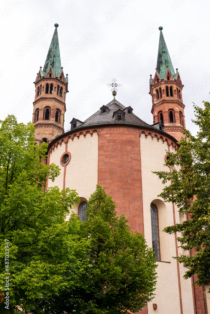 Brick colored towers with bronze green roofs at Würzburger Cathedral or Würzburger Dom and the apse roof seen from the presbitery side