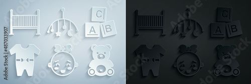 Set Happy little girl head, ABC blocks, Baby clothes, Teddy bear plush toy, crib hanging toys and cradle bed icon. Vector