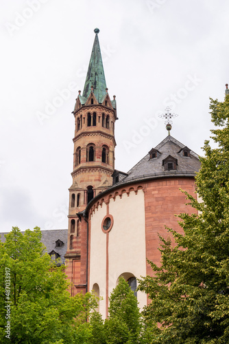 Brick colored towers with bronze green roofs at Würzburger Cathedral or Würzburger Dom and the apse roof seen from the presbitery side