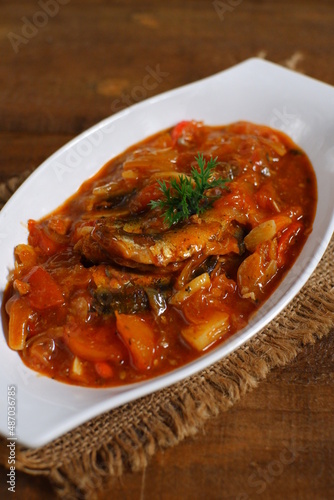 a plate of sardines cooked in spicy sauce  © EndwiaAS