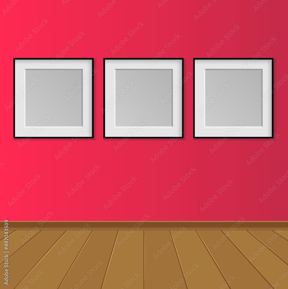 three poster frames on the red wall in the gallery interior three poster frames on the red wall in the gallery interior