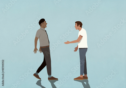 Man with hand outstretched greeting surprised businessman
 photo