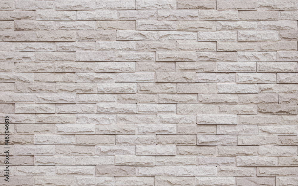 Obraz premium Cream and beige brick wall texture background. Brickwork old vintage brick wall backdrop.