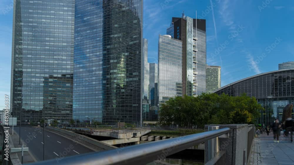 Lifestyle at La Defense Business District Paris Pedestrians Traffic Towers Sun and Clouds Lifestyle at La Defense Business District Paris Pedestrians Traffic Towers Sun and Clouds