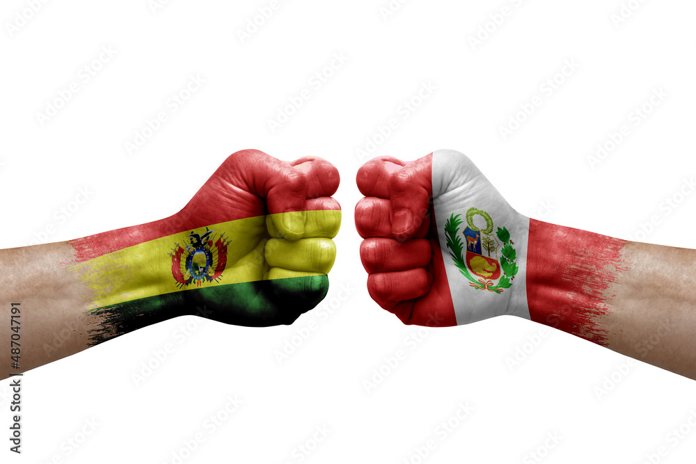 Two hands punch to each others on white background. Country flags painted fists, conflict crisis concept between bolivia and peru - obrazy, fototapety, plakaty 